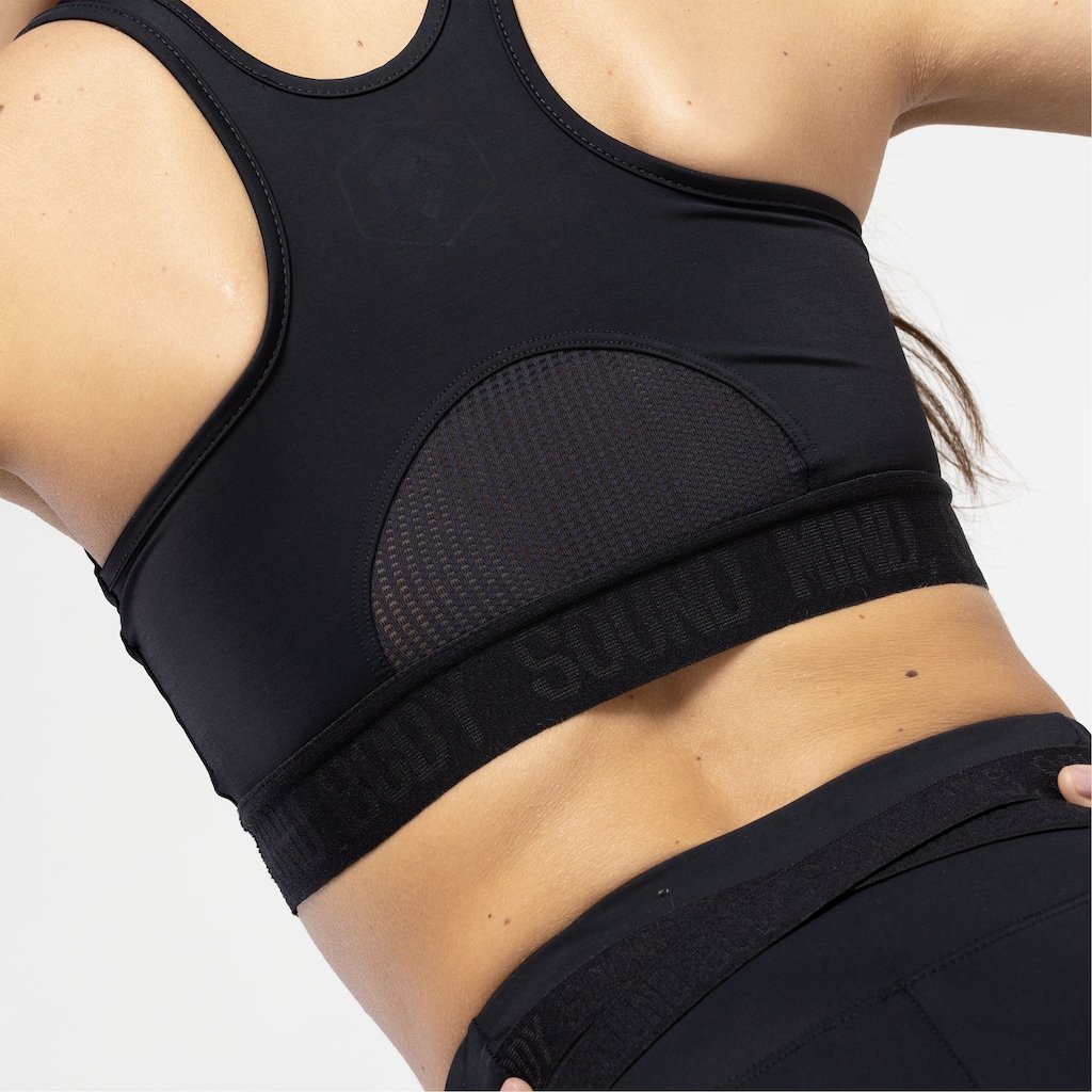 Imagem 5 do produto Top Fitness sem Bojo ASICS Lic Alta Sustentação Sound Mind - Adulto