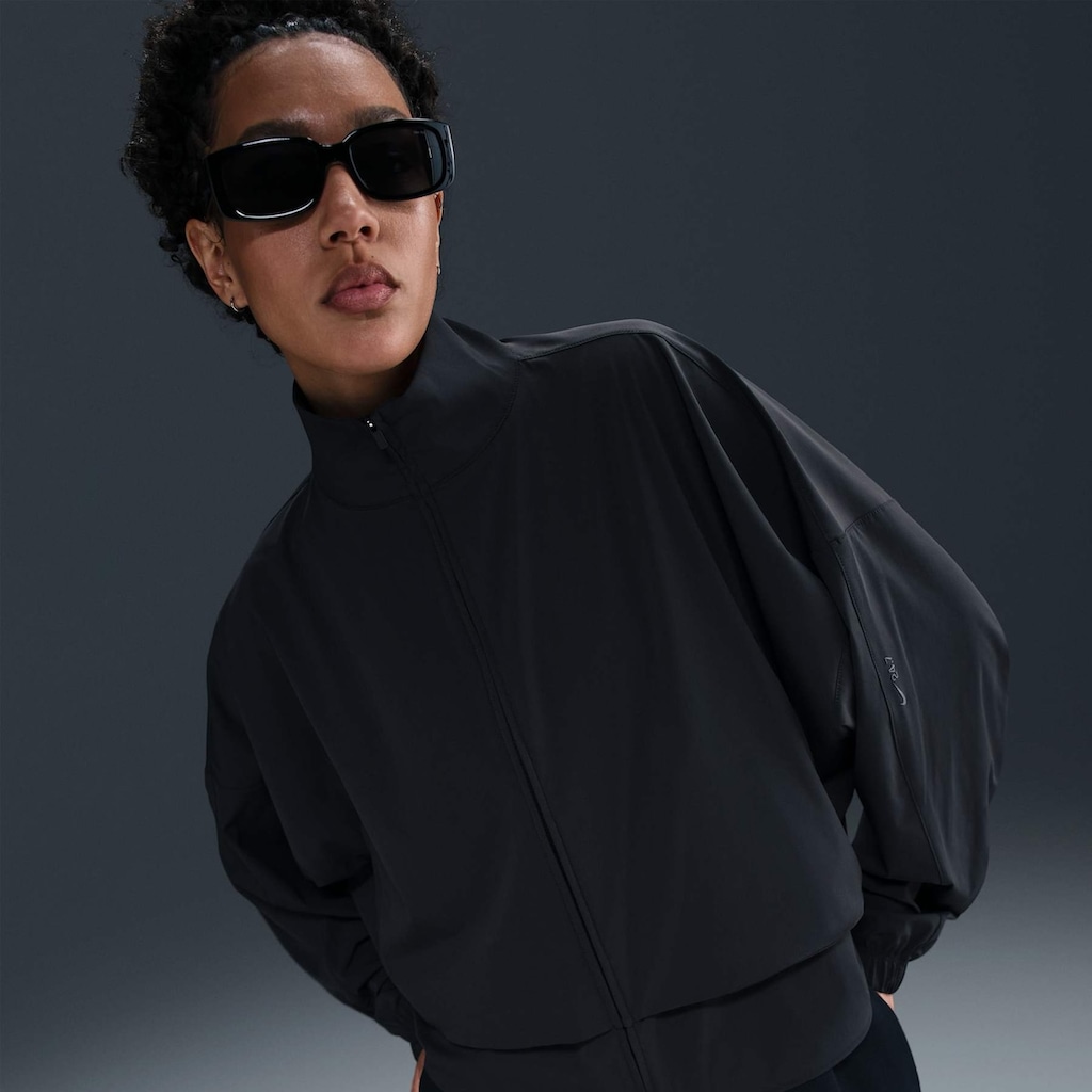 Jaqueta Nike Dri-FIT Woven - Feminina