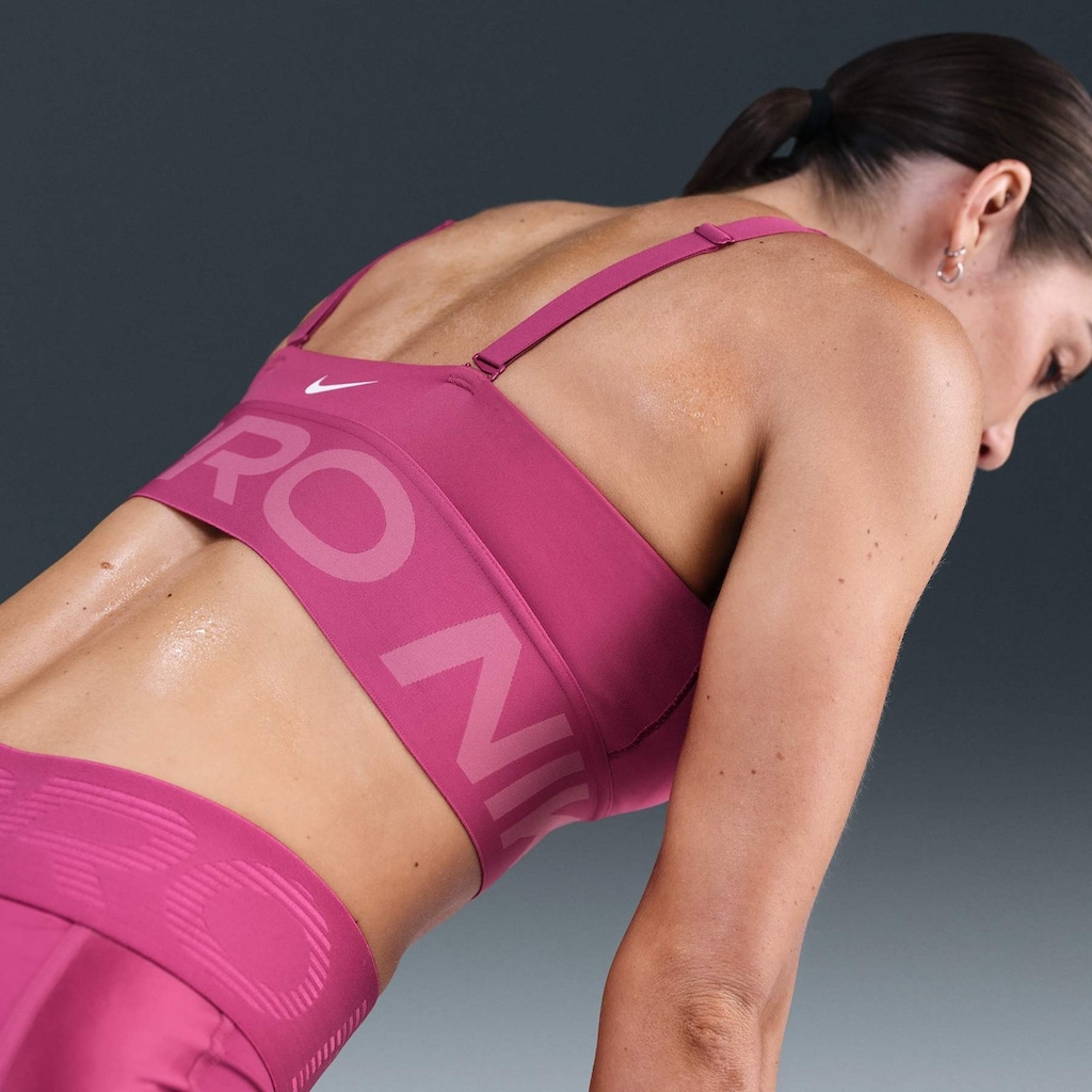 Top Nike Pro Indy Plunge Feminino em Promoção | Centauro