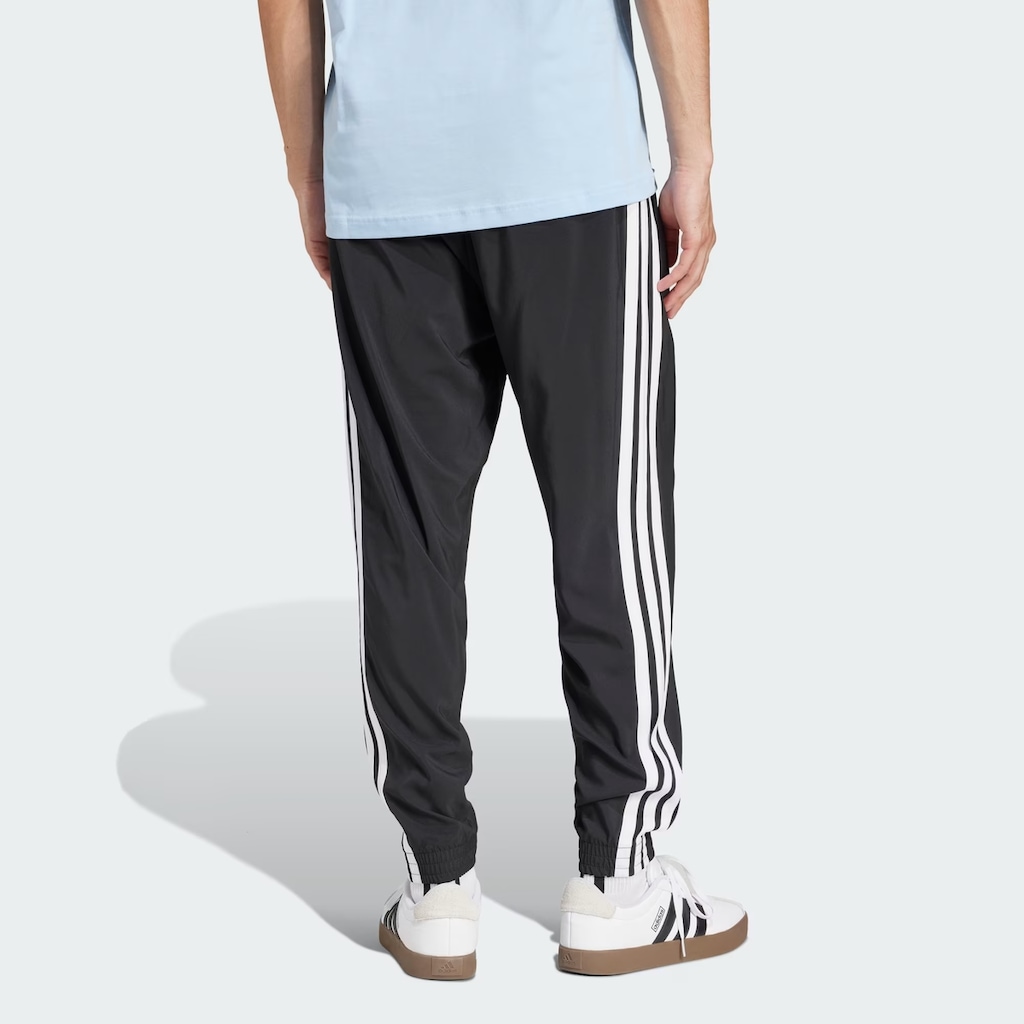 Imagem 2 do produto Calça adidas Essentials 3 Listras Malha com Punho Masculina