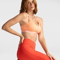 Top Fitness com Bojo Nike Baixa Sustentação Dri-Fit Indy SPT BRA CORAL