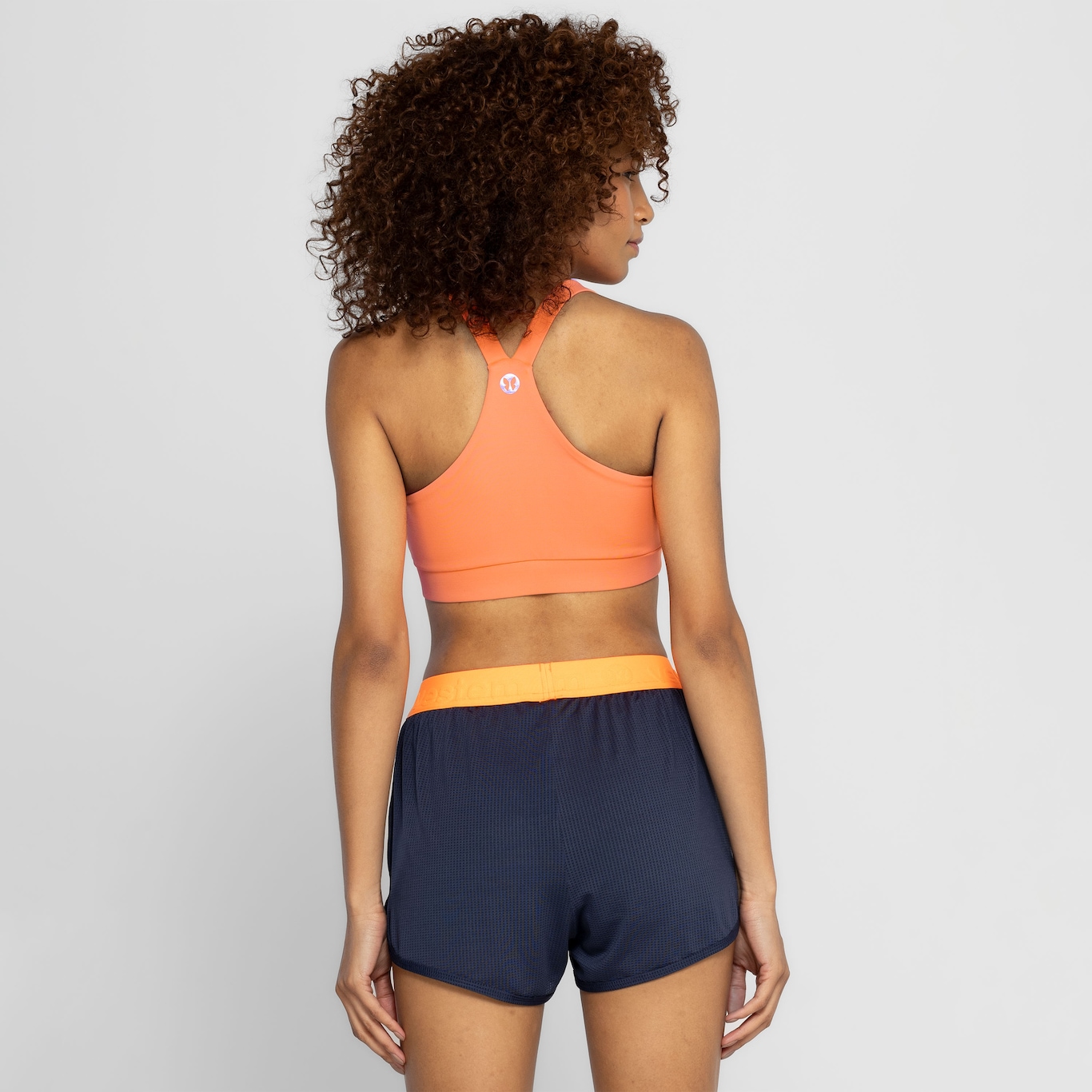 Top Fitness com Bojo Nike Média Sustentação Swoosh Futura BRA