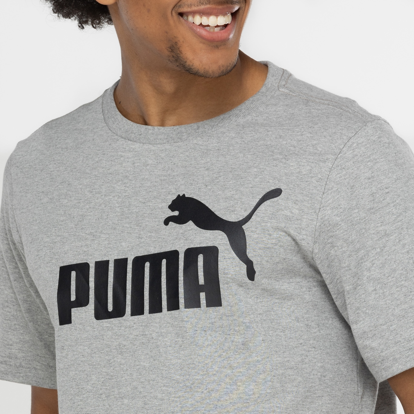 Camiseta Masculina Puma Manga Curta ESS Tee Logo - Foto 6