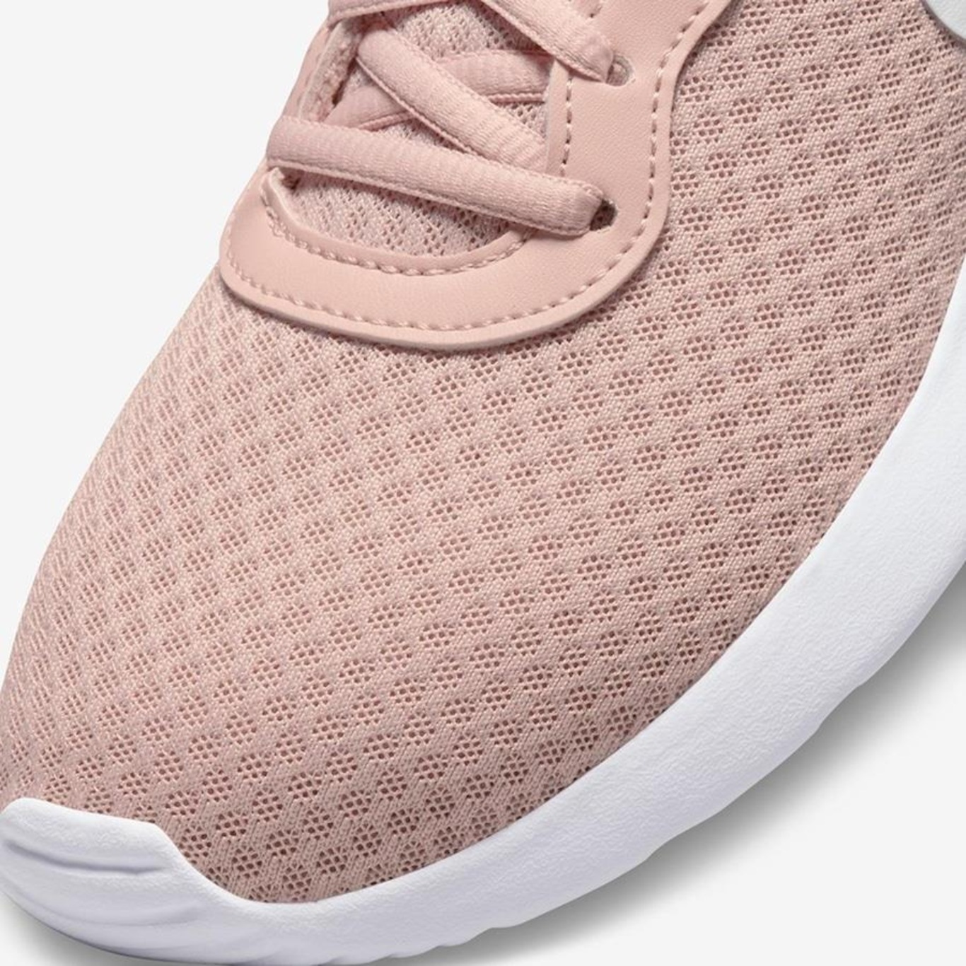 Light pink hot sale nike tanjun