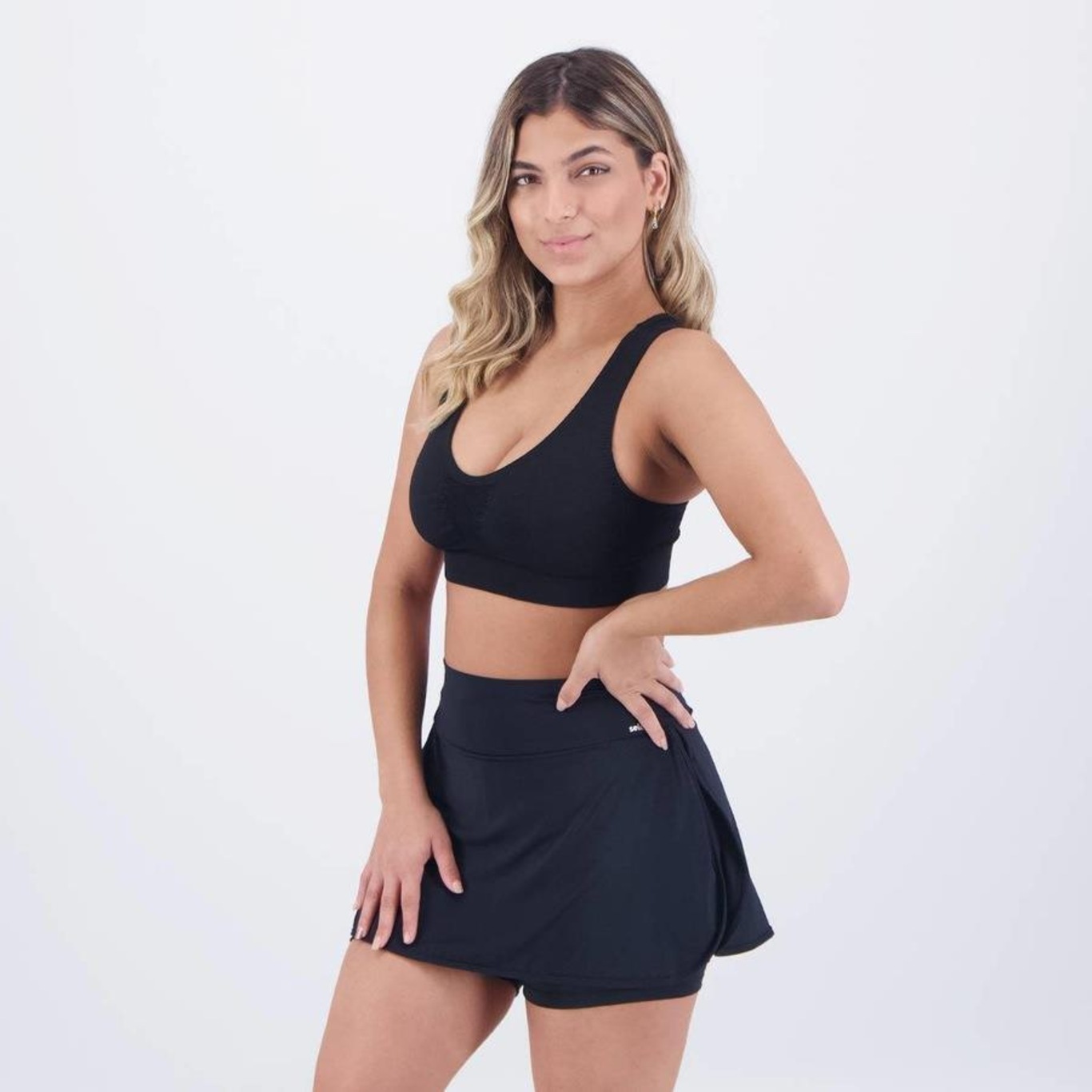 Conjunto selene Top Fitness com Bojo sem Costura + Shorts Saia - Feminino - Foto 4