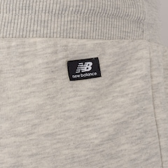 Calça New Balance Felpa Essentials Feminina - Foto 4