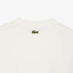 Camiseta em Algodão com Estampa Assinada Unissex Lacoste - Foto 11