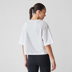 Camiseta New Balance Reimagined Feminina - Foto 4