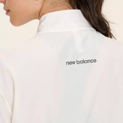 Jaqueta New Balance Corta Vento Sport Essentials - Feminina - Foto 5