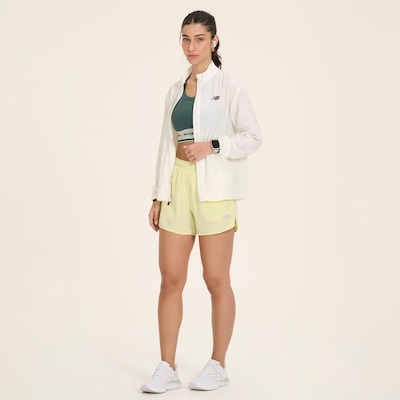 Jaqueta New Balance Corta Vento Sport Essentials - Feminina - Foto 6