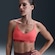 Top Fitness Nike Indy - Feminino LARANJA