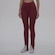 Calça Umbro Essential Flare - Feminina VERMELHO