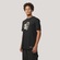 Camiseta Regular MCD Caveira Metamorfose Masculino PRETO