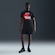 Camiseta Nike Sportswear 6MO Futura Masculina PRETO/LARANJA