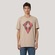 Camiseta Regular MCD Pipa Esqueleto Raio X Masculino BEGE