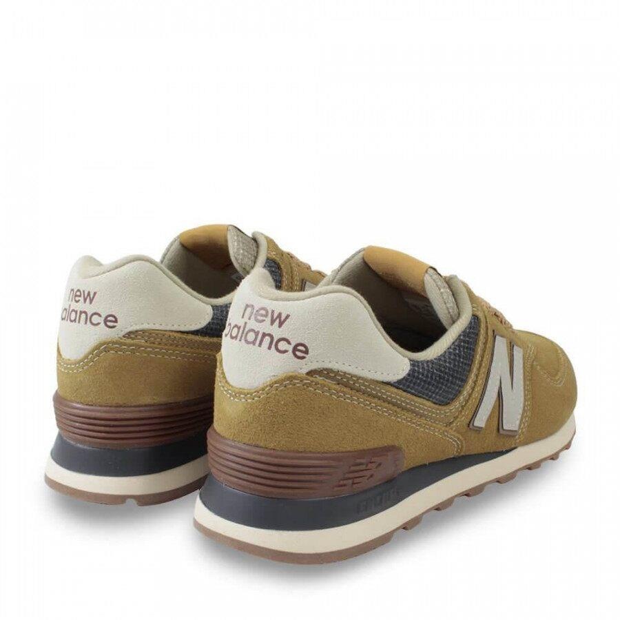 tenis new balance mostarda